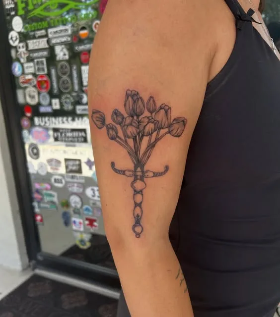 Ornamental floral piece on an upper arm